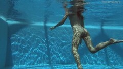 Kinky Irina Russaka Strips Naked in The Swimming Pool Thumb